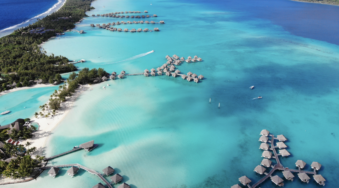 Aerial view of Bora Bora's turquoise lagoon and Mount Otemanu